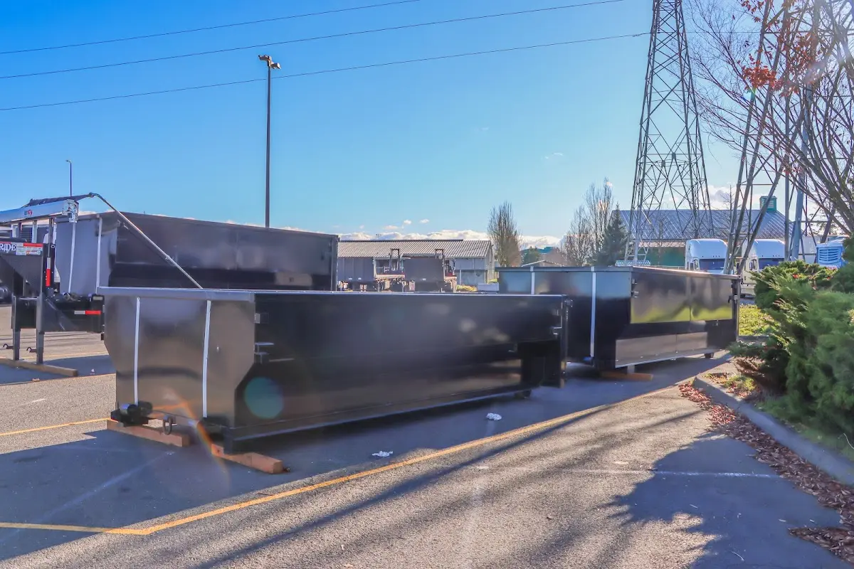 Roll-off dumpster ready for waste disposal at job site for Concrete Dumpster Rental in Swartz Creek